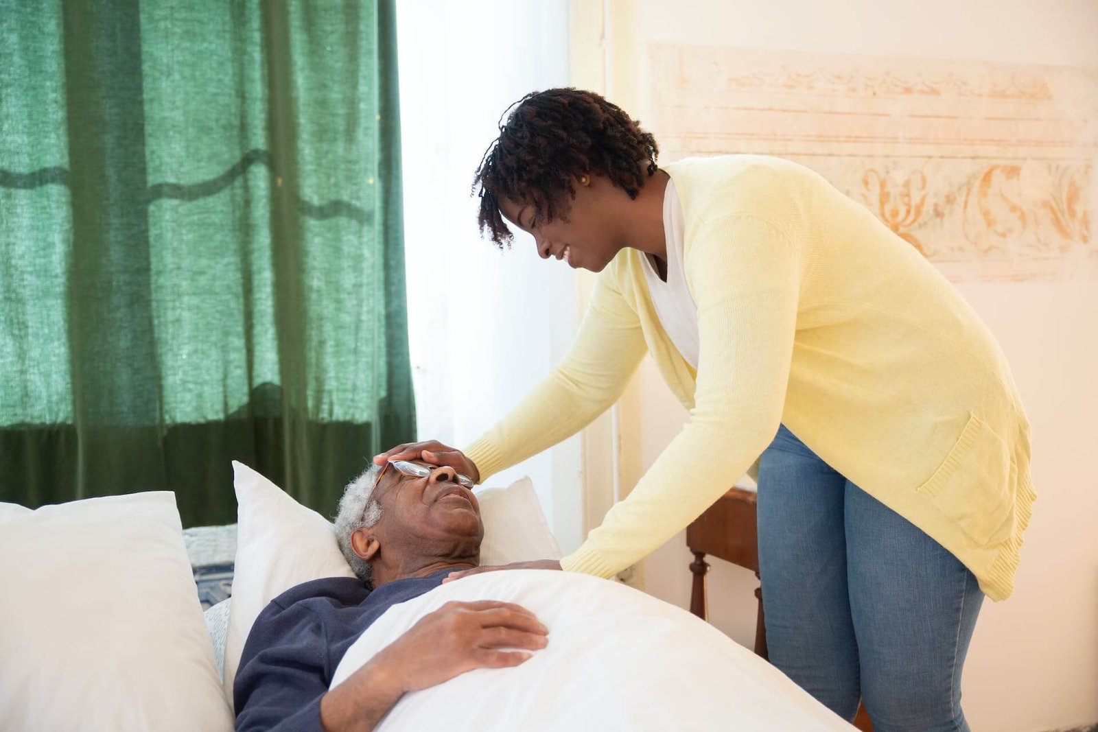 female social worker and old man
